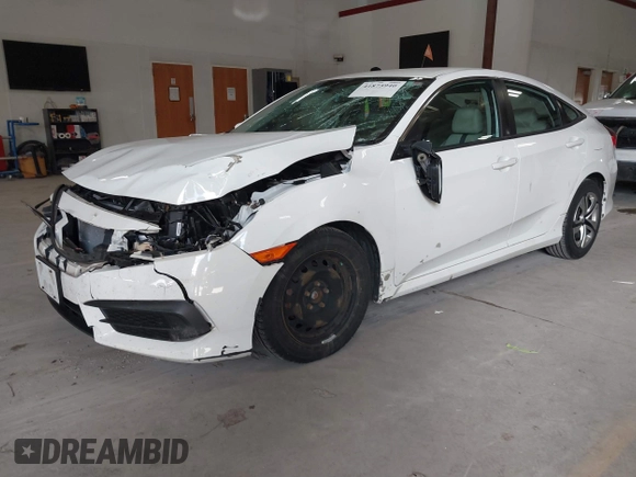 2016 Honda Civic Sedan LX with VIN 19XFC2F59GE028056, listed as a IAAI auction lot 41875940 with 124,243 mi miles. Bid and sale history available at carsss.com. Image 17.