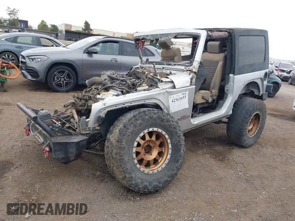 2009 Jeep Wrangler X with VIN 1J4FA24149L775557, listed as a IAAI auction lot 42363653 with Not provided miles and . Bid and sale history available at DreamBid. Image 2.