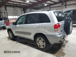 2001 Toyota RAV4 z VIN JTEGH20V610015422, wystawiony jako Copart lot #57053185 z przebiegiem 197 829 mil mil oraz Szkoda całkowita • Salvage title. Historia ofert i sprzedaży dostępna na DreamBid. Obrazek 2.