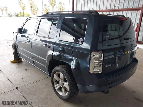 2014 Jeep Patriot Latitude with VIN 1C4NJRFB7ED784130, listed as a IAAI auction lot 41939216 with 141,250 mi miles. Bid and sale history available at carsss.com. Image 3.