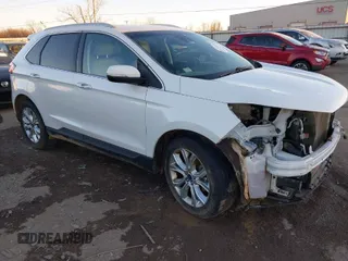 2020 Ford Edge Titanium z VIN 2FMPK3K95LBA11256, wystawiony jako IAAI lot #41131966 z przebiegiem 133 412 mil mil oraz . Historia ofert i sprzedaży dostępna na DreamBid. Obrazek 1.