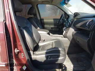 2014 Honda Pilot EX-L with VIN 5FNYF4H52EB055650, listed as a IAAI auction lot 41544068 with 205,942 mi miles and . Bid and sale history available at DreamBid. Image 5.