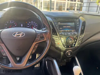 2016 Hyundai Veloster Turbo Rally Edition with VIN KMHTC6AE1GU303773, listed as a Copart auction lot 50099085 with 47,495 mi miles and Clean Title. Bid and sale history available at carsss.com. Image 9.
