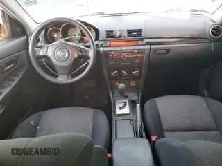 2007 Mazda 3 i Touring with VIN JM1BK32F571676258, listed as a Copart auction lot 87883545 with 141,203 mi miles and Salvage Title. Bid and sale history available at DreamBid. Image 8.