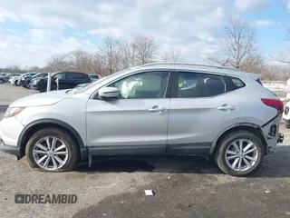 2017 Nissan Rogue SL z VIN JN1BJ1CR9HW108652, wystawiony jako IAAI lot #41418435 z przebiegiem 54 481 mil mil oraz . Historia ofert i sprzedaży dostępna na DreamBid. Obrazek 14.