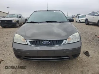 2007 Ford Focus S with VIN 1FAFP31N87W226088, listed as a Copart auction lot 88584555 with 83,896 mi miles and Salvage Title. Bid and sale history available at DreamBid. Image 5.