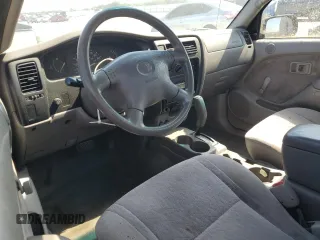 2001 Toyota Tacoma z VIN 5TENL42N01Z760573, wystawiony jako Copart lot #55694585 z przebiegiem 198 805 mil mil oraz Czysty tytuł • Clean title. Historia ofert i sprzedaży dostępna na DreamBid. Obrazek 8.