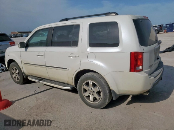 2011 Honda Pilot Touring z VIN 5FNYF3H98BB005411, wystawiony jako Copart lot #52392765 z przebiegiem 155 541 mil mil oraz Szkoda całkowita • Salvage title. Historia ofert i sprzedaży dostępna na DreamBid. Obrazek 2.