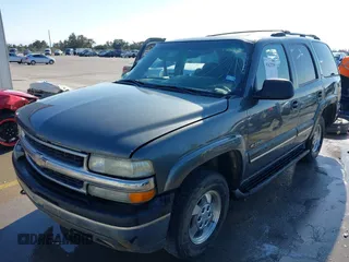 2002 Chevrolet Tahoe LT z VIN 1GNEC13Z42R319646, wystawiony jako IAAI lot #41623259 z przebiegiem 250 430 mil mil oraz . Historia ofert i sprzedaży dostępna na DreamBid. Obrazek 22.
