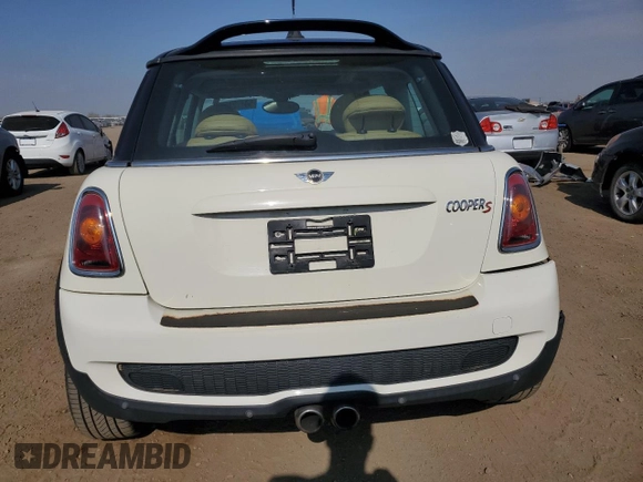 2009 MINI Hardtop S with VIN WMWMF73529TW81190, listed as a Copart auction lot 54172195 with 83,841 mi miles and Salvage Title. Bid and sale history available at DreamBid. Image 6.