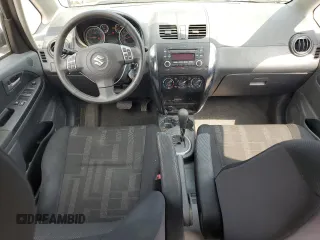2012 Suzuki SX4 Crossover z VIN JS2YB5A39C6307239, wystawiony jako Copart lot #59947195 z przebiegiem 87 781 mil mil oraz Czysty tytuł • Clean title. Historia ofert i sprzedaży dostępna na DreamBid. Obrazek 8.