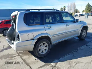 2003 Suzuki XL7 Touring z VIN JS3TX92V734114162, wystawiony jako IAAI lot #41250622 z przebiegiem 227 494 mil mil oraz . Historia ofert i sprzedaży dostępna na DreamBid. Obrazek 4.