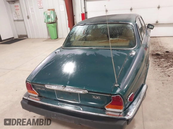 1985 Jaguar XJ with VIN SAJAV1347FC414864, listed as a IAAI auction lot 42118511 with 117,185 mi miles and . Bid and sale history available at DreamBid. Image 16.
