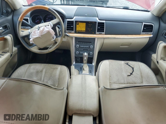 2010 Lincoln MKZ z VIN 3LNHL2GC7AR650494, wystawiony jako Copart lot #55113205 z przebiegiem 187 116 mil mil oraz Szkoda całkowita • Salvage title. Historia ofert i sprzedaży dostępna na DreamBid. Obrazek 8.