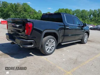 2021 GMC Sierra 1500 Denali with VIN 1GTU9FEL4MZ253708, listed as a IAAI auction lot 42209839 with 52,279 mi miles and . Bid and sale history available at DreamBid. Image 4.