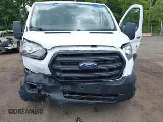 2020 Ford Transit Cargo z VIN 1FTBR2Y80LKB22354, wystawiony jako IAAI lot #42347579 z przebiegiem 64 513 mil mil oraz . Historia ofert i sprzedaży dostępna na DreamBid. Obrazek 6.
