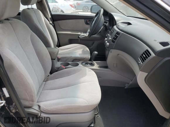 2010 Kia Optima LX with VIN KNAGG4A87A5391946, listed as a Copart auction lot 54005025 with 144,652 mi miles and Salvage Title. Bid and sale history available at carsss.com. Image 7.
