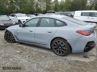 2023 BMW i4 M50 with VIN WBY33AW02PFP88948, listed as a Copart auction lot 67563423 with 2,090 mi miles. Bid and sale history available at carsss.com. Image 2.