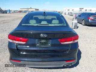 2016 Kia Optima LX with VIN 5XXGT4L32GG108695, listed as a IAAI auction lot 41647970 with 125,319 mi miles. Bid and sale history available at carsss.com. Image 16.