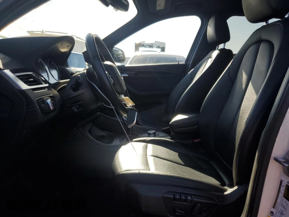 2021 BMW X1 xDrive28i with VIN WBXJG9C09M5S71263, listed as a Copart auction lot 46374565 with 61,537 mi miles and Salvage Title. Bid and sale history available at carsss.com. Image 7.