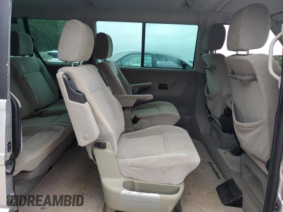 2002 Volkswagen EuroVan с VIN WV2KB47022H065941, выставлен на аукционе Copart как лот 79238234 с пробегом Не указан миль и Чистый • Clean title. История ставок и продаж доступна на DreamBid. Изображение 10.