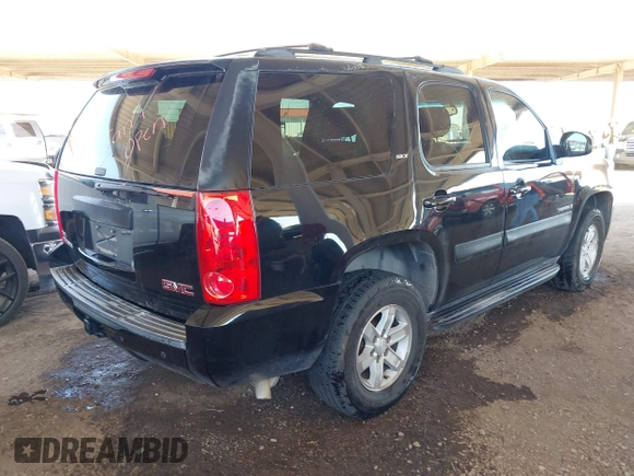2008 GMC Yukon SLT w/4SB with VIN 1GKFK13068J200767, listed as a IAAI auction lot 42005014 with 297,242 mi miles. Bid and sale history available at carsss.com. Image 4.