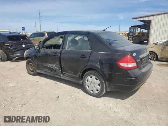 2010 Nissan Versa S with VIN 3N1BC1AP0AL409740, listed as a Copart auction lot 48996685 with 136,924 mi miles and Salvage Title. Bid and sale history available at DreamBid. Image 2.