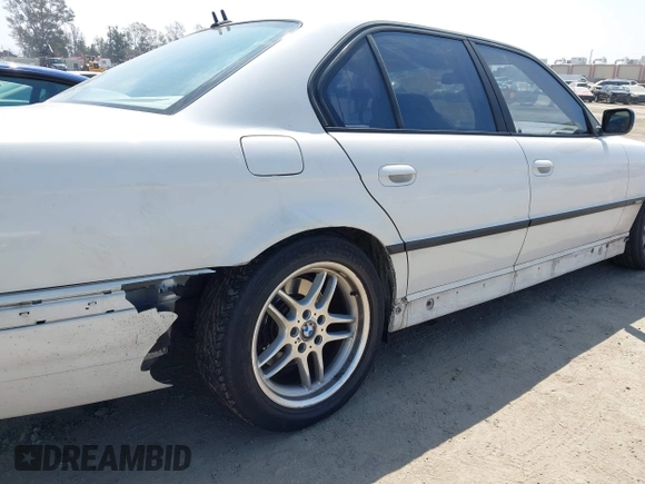 2001 BMW 7 Series 740iA with VIN WBAGG83451DN86421, listed as a IAAI auction lot 42104053 with 241,586 mi miles. Bid and sale history available at carsss.com. Image 6.