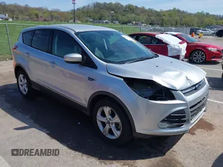 2016 Ford Escape SE with VIN 1FMCU9G98GUA10333, listed as a IAAI auction lot 42021490 with 128,973 mi miles. Bid and sale history available at carsss.com. Image 1.