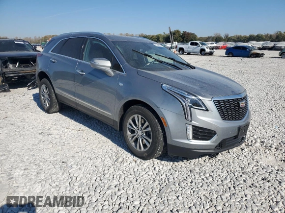 2023 Cadillac XT5 FWD Premium Luxury with VIN 1GYKNCRS6PZ100071, listed as a Copart auction lot 76248224 with 25,613 mi miles and Salvage Title. Bid and sale history available at carsss.com. Image 4.