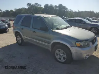 2005 Ford Escape Hybrid z VIN 1FMCU95HX5KB95634, wystawiony jako Copart lot #56513595 z przebiegiem 228 188 mil mil oraz Czysty tytuł • Clean title. Historia ofert i sprzedaży dostępna na DreamBid. Obrazek 4.