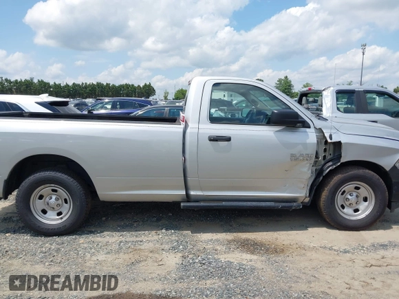 2018 Ram 1500 Tradesman with VIN 3C6JR6DG8JG129127, listed as a IAAI auction lot 42540299 with 117,414 mi miles and . Bid and sale history available at DreamBid. Image 13.
