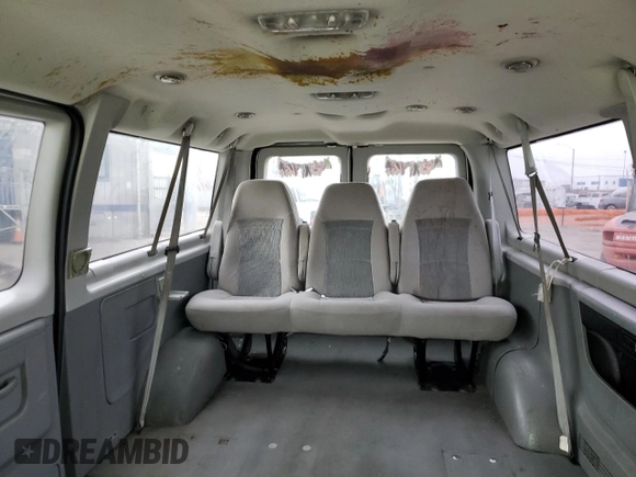 2006 Ford Econoline Passenger XL with VIN 1FMRE11W46DB09883, listed as a Copart auction lot 69028364 with 200,878 mi miles and Salvage Title. Bid and sale history available at DreamBid. Image 10.