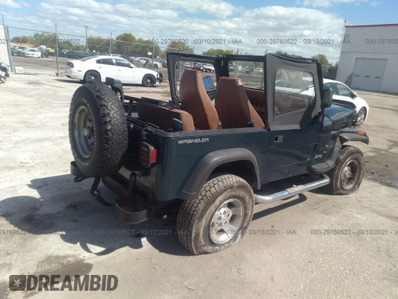 1995 Jeep Wrangler S with VIN 1J4FY19P4SP207049, listed as a IAAI auction lot 41315322 with 12,454 mi miles. Bid and sale history available at carsss.com. Image 4.