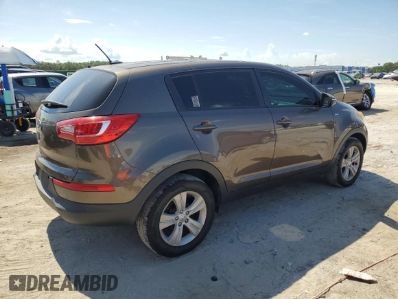 2012 Kia Sportage LX with VIN KNDPBCA20C7214959, listed as a Copart auction lot 62730645 with 194,768 mi miles and Clean title. Bid and sale history available at DreamBid. Image 3.