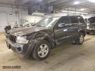 2006 Jeep Grand Cherokee Laredo with VIN 1J4GS48K26C285341, listed as a Copart auction lot 59287334 with 218,787 mi miles and Salvage Title. Bid and sale history available at carsss.com. Image 1.