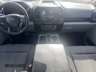 2019 Ford F-150 XL with VIN 1FTEW1CP1KKF22890, listed as a Copart auction lot 61813095 with 63,774 mi miles and Salvage title. Bid and sale history available at DreamBid. Image 8.