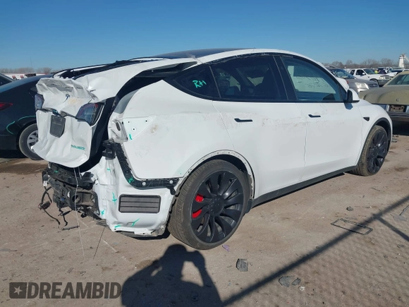 2023 Tesla Model Y Performance with VIN 7SAYGDEF1PF864976, listed as a IAAI auction lot 41667676 with Not Provided miles and . Bid and sale history available at DreamBid. Image 4.