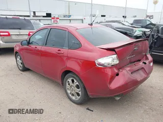 2009 Ford Focus SES with VIN 1FAHP36N59W244231, listed as a IAAI auction lot 41967664 with 141,937 mi miles. Bid and sale history available at carsss.com. Image 3.