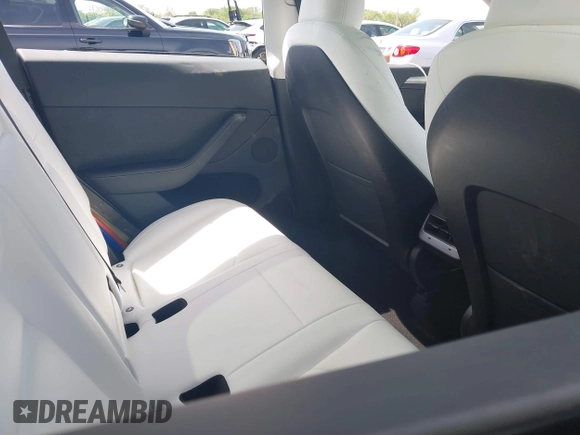 2023 Tesla Model Y Long Range z VIN 7SAYGDEE1PA158661, wystawiony jako IAAI lot #41983897 z przebiegiem 20 176 mil mil oraz . Historia ofert i sprzedaży dostępna na DreamBid. Obrazek 8.