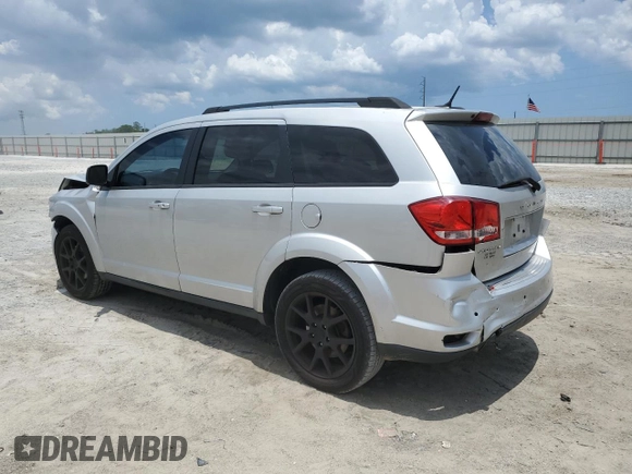 2013 Dodge Journey SXT with VIN 3C4PDCBG4DT685370, listed as a Copart auction lot 61353335 with 193,973 mi miles and Salvage title. Bid and sale history available at DreamBid. Image 2.