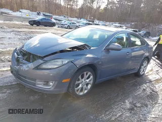 2009 Mazda 6 S Grand Touring with VIN 1YVHP82B995M06204, listed as a IAAI auction lot 41578992 with 140,255 mi miles and . Bid and sale history available at DreamBid. Image 2.