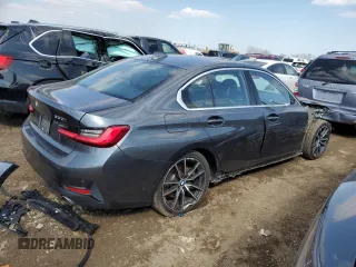 2019 BMW 3 Series 330i with VIN WBA5R1C55KAJ98853, listed as a Copart auction lot 50699315 with 101,110 mi miles and Salvage title. Bid and sale history available at DreamBid. Image 3.