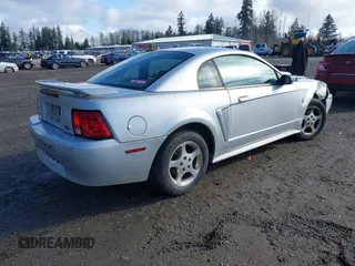 2003 Ford Mustang Standard with VIN 1FAFP40413F312108, listed as a IAAI auction lot 41954137 with 90,415 mi miles. Bid and sale history available at carsss.com. Image 4.