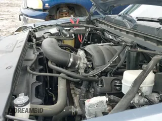 2016 Chevrolet Silverado 1500 LT z VIN 1GCUKREC6GF115924, wystawiony jako IAAI lot #41676710 z przebiegiem 88 838 mil mil oraz . Historia ofert i sprzedaży dostępna na DreamBid. Obrazek 19.