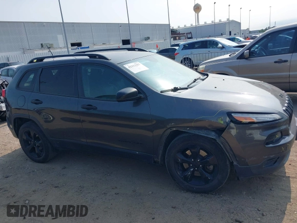 2017 Jeep Cherokee Altitude z VIN 1C4PJLAB9HW623297, wystawiony jako IAAI lot #42313357 z przebiegiem 220 795 mil mil oraz . Historia ofert i sprzedaży dostępna na DreamBid. Obrazek 13.