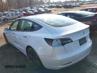 2021 Tesla Model 3 Long Range with VIN 5YJ3E1EB1MF056759, listed as a IAAI auction lot 41464108 with 48,694 mi miles and . Bid and sale history available at carsss.com. Image 14.