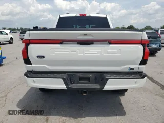 2022 Ford F-150 Lightning Pro with VIN 1FTVW1EL3NWG16146, listed as a Copart auction lot 65322785 with 68,928 mi miles and Salvage title. Bid and sale history available at DreamBid. Image 6.