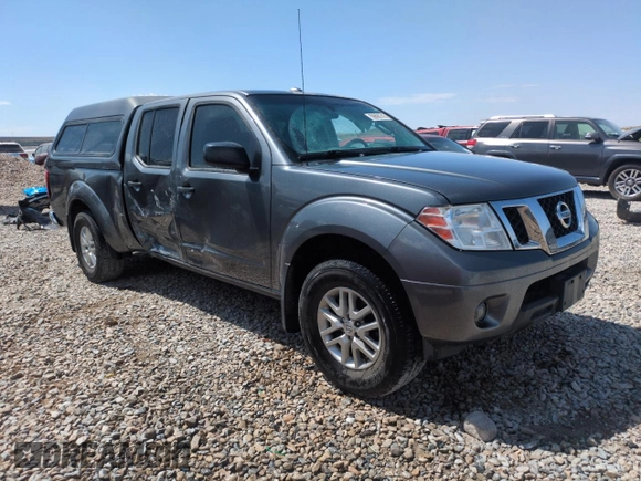 2016 Nissan Frontier SV with VIN 1N6AD0FV5GN780728, listed as a Copart auction lot 59890745 with 135,059 mi miles and Salvage title. Bid and sale history available at DreamBid. Image 4.