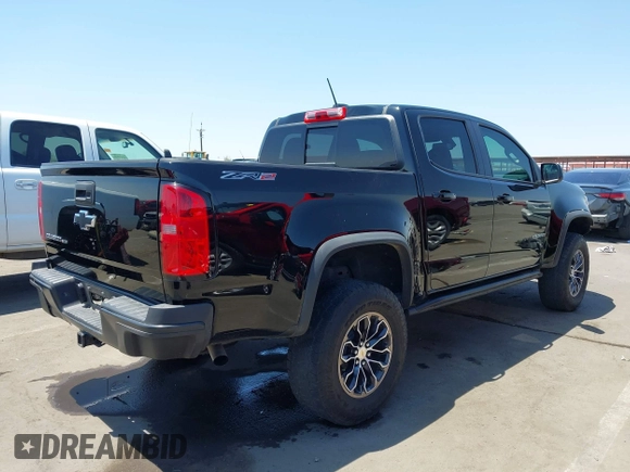 2018 Chevrolet Colorado 4WD ZR2 z VIN 1GCGTEEN5J1259764, wystawiony jako IAAI lot #42474810 z przebiegiem 111 187 mil mil oraz . Historia ofert i sprzedaży dostępna na DreamBid. Obrazek 4.